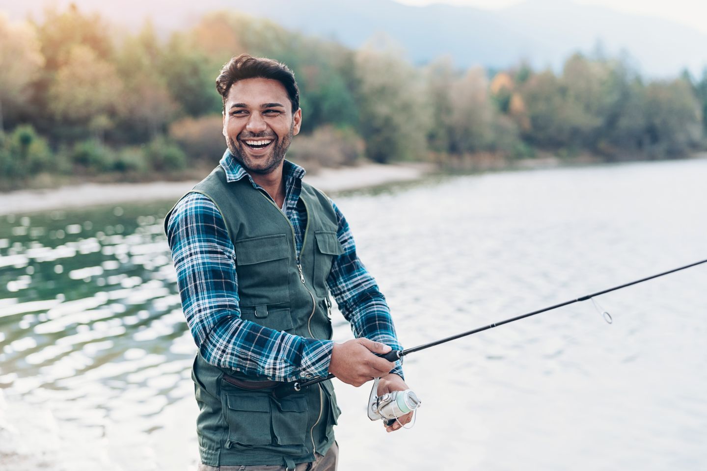 Man happily fishing without suffering from BPPV
